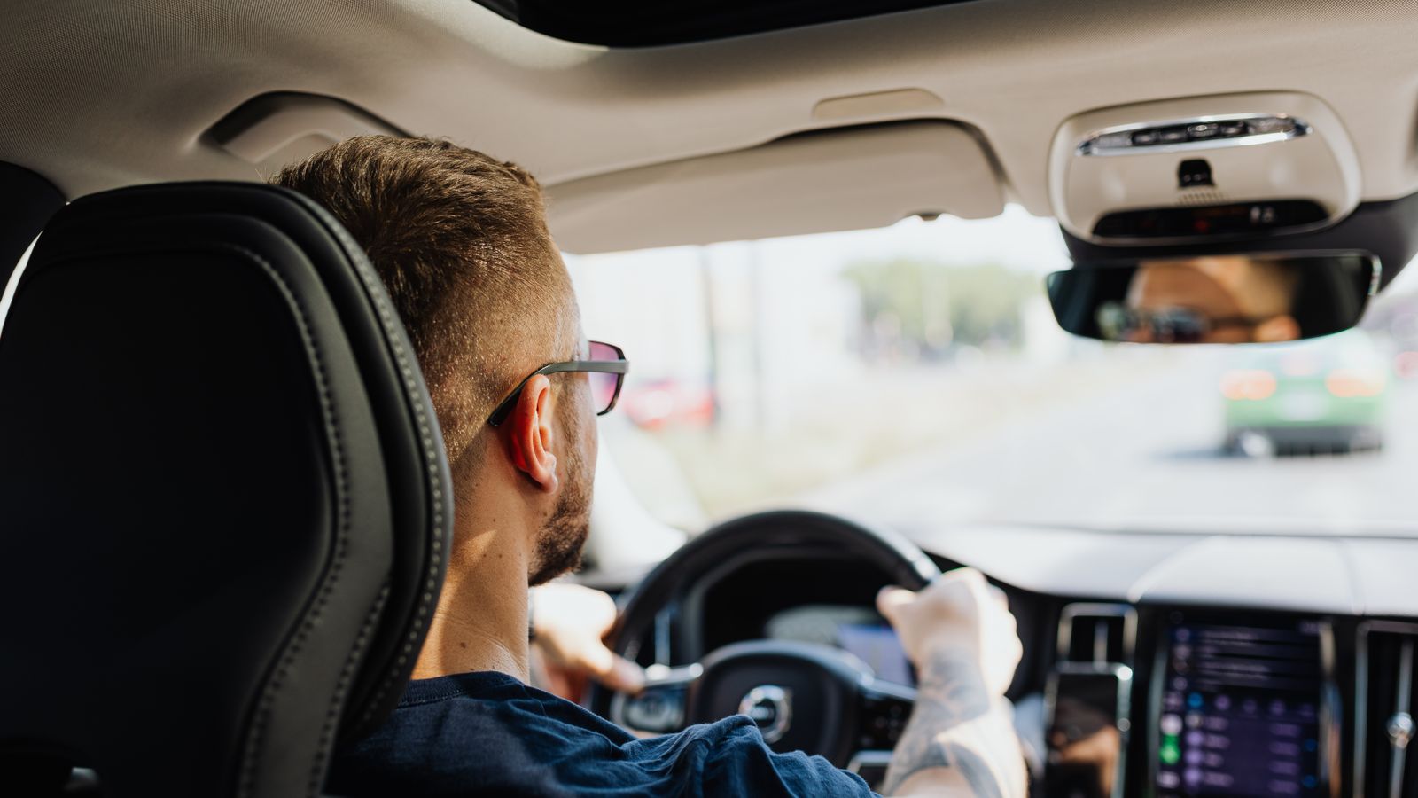 Driver at the wheel of a car